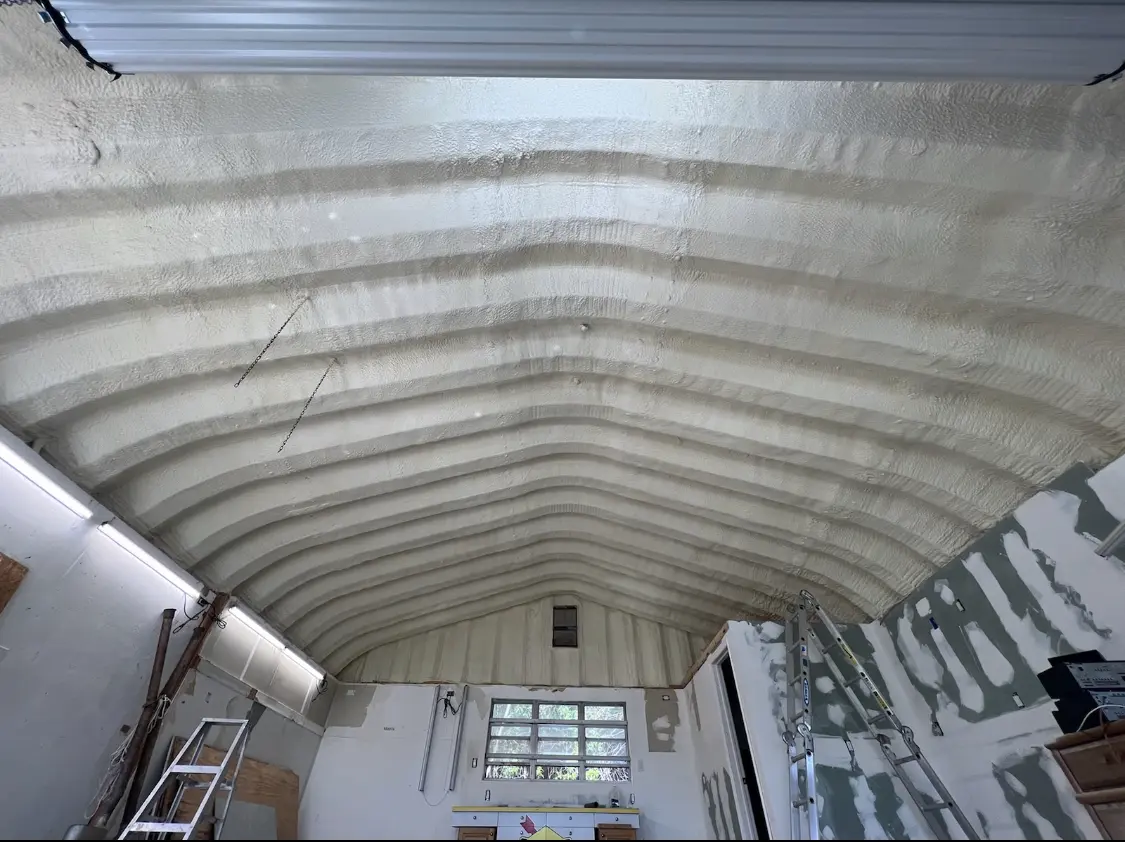 Spray polyurethane foam applied to the underside of a metal roof deck in Marion Oaks